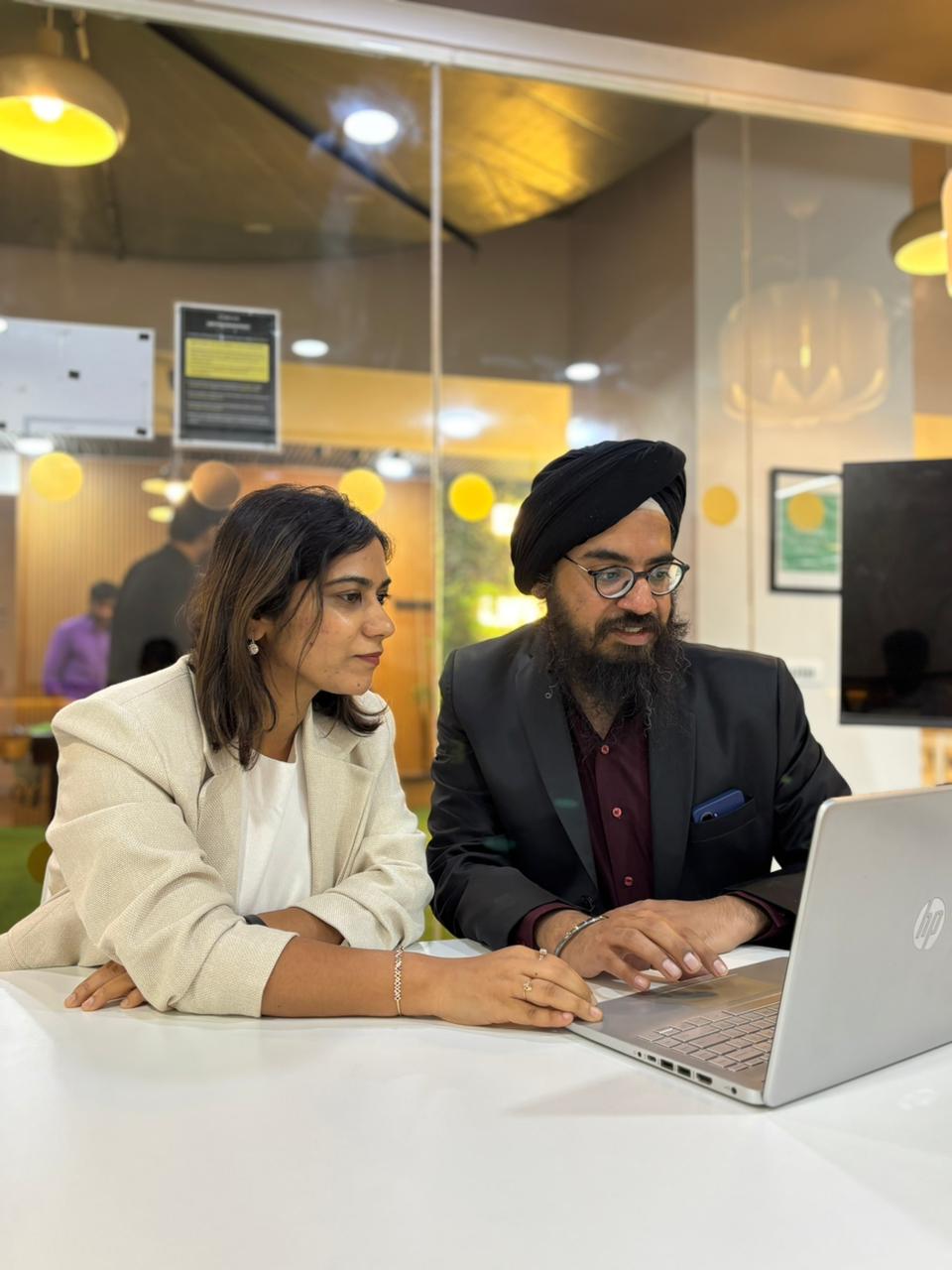 Founders Swaran and Ayushi working together